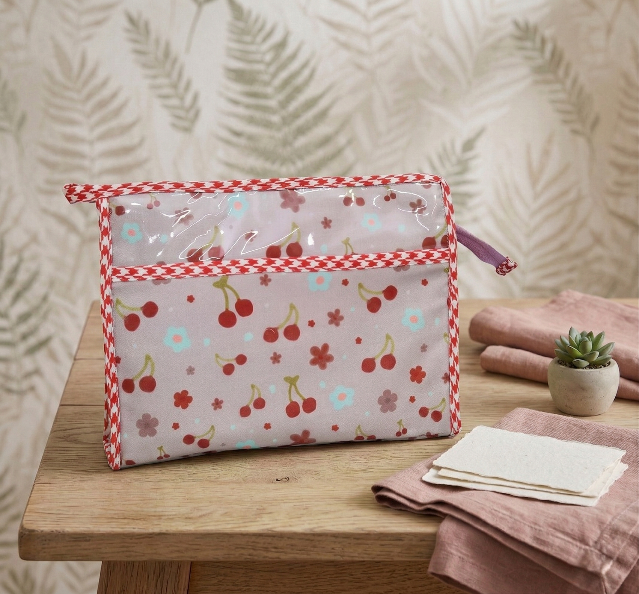 SCARLET CHERRY PRINT TRIOZIP TOILETRY BAG