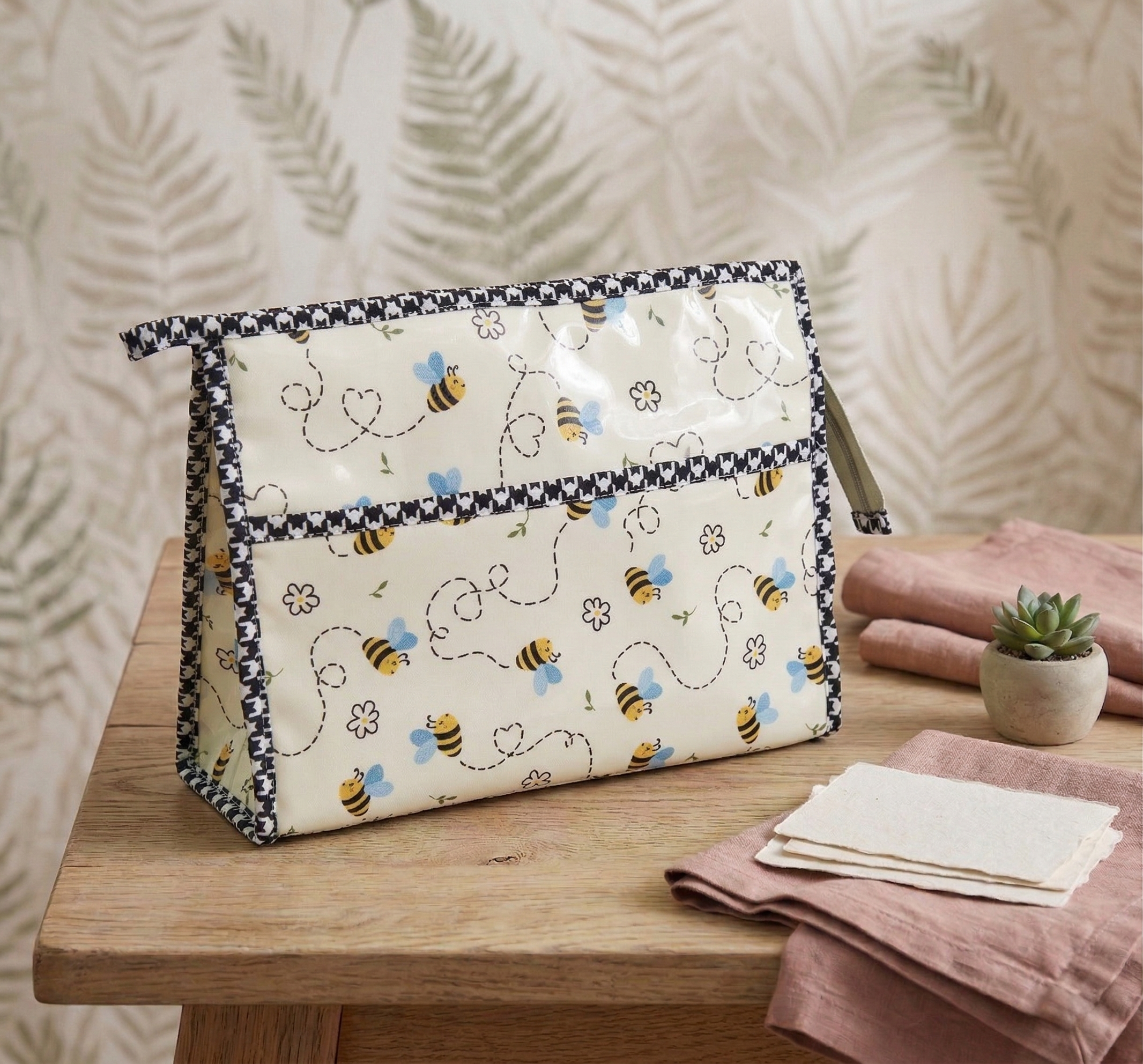 HONEYBEE DOODLE PRINT TRIOZIP TOILETRY BAG